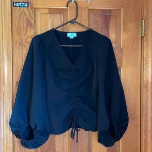 Corset blouse with puffy sleeves